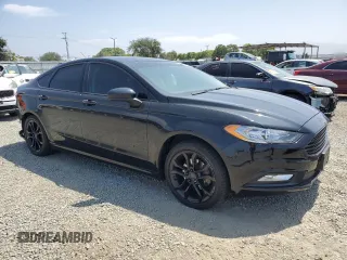 2017 Ford Fusion Hybrid SE with VIN 3FA6P0LUXHR196115, listed as a Copart auction lot 61049125 with 137,613 mi miles and Salvage title. Bid and sale history available at DreamBid. Image 4.