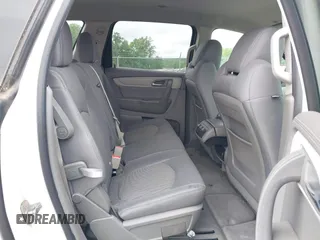 2015 Chevrolet Traverse LS z VIN 1GNKVFED4FJ197970, wystawiony jako IAAI lot #42020771 z przebiegiem 128 876 mil mil oraz . Historia ofert i sprzedaży dostępna na DreamBid. Obrazek 8.