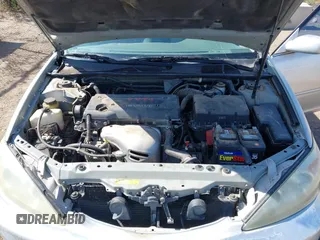 2003 Toyota Camry LE with VIN 4T1BE30K63U769219, listed as a IAAI auction lot 42178777 with 293,769 mi miles and . Bid and sale history available at DreamBid. Image 10.