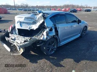 2016 Subaru WRX Premium with VIN JF1VA1E65G9810998, listed as a IAAI auction lot 41545599 with 123,135 mi miles. Bid and sale history available at carsss.com. Image 4.
