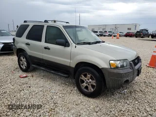 2006 Ford Escape XLT with VIN 1FMYU03Z26KA85627, listed as a Copart auction lot 83552474 with 234,677 mi miles and Clean Title. Bid and sale history available at carsss.com. Image 4.