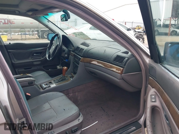 1998 BMW 7 Series 740il with VIN WBAGJ8323WDM23239, listed as a IAAI auction lot 41512630 with 221,673 mi miles. Bid and sale history available at carsss.com. Image 5.