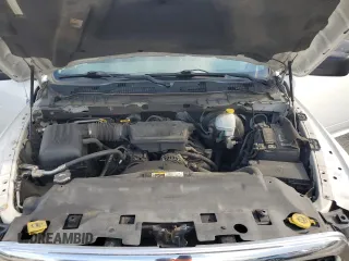 2013 Ram 1500 SLT z VIN 3C6JR7EP9DG528945, wystawiony jako Copart lot #57065605 z przebiegiem 148 498 mil mil oraz Czysty tytuł • Clean title. Historia ofert i sprzedaży dostępna na DreamBid. Obrazek 11.