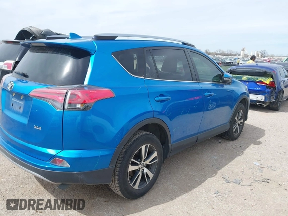 2018 Toyota RAV4 XLE with VIN JTMWFREV2JJ752568, listed as a IAAI auction lot 41795891 with 37,886 mi miles. Bid and sale history available at carsss.com. Image 4.