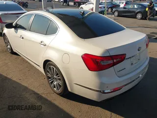 2014 Kia Cadenza Premium with VIN KNALN4D79E5157353, listed as a IAAI auction lot 41291153 with 141,049 mi miles. Bid and sale history available at carsss.com. Image 3.