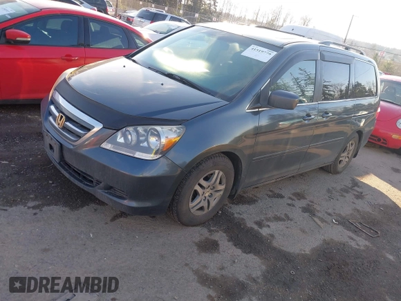 2005 Honda Odyssey EX-L with VIN 5FNRL38685B423426, listed as a IAAI auction lot 41519779 with 423,419 mi miles. Bid and sale history available at carsss.com. Image 2.