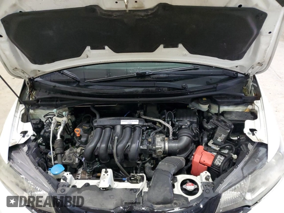 2017 Honda Fit EX with VIN JHMGK5H77HS003015, listed as a Copart auction lot 57205495 with 112,481 mi miles and Salvage title. Bid and sale history available at DreamBid. Image 11.