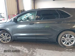 2015 Ford Edge SEL with VIN 2FMTK3J80FBB24088, listed as a IAAI auction lot 41724786 with 101,066 mi miles. Bid and sale history available at carsss.com. Image 14.