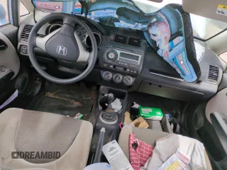 2007 Honda Fit with VIN JHMGD37477S061629, listed as a Copart auction lot 60435605 with 89,193 mi miles and Clean title. Bid and sale history available at DreamBid. Image 8.