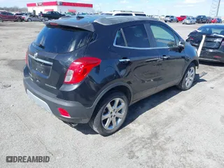 2014 Buick Encore Leather with VIN KL4CJCSB0EB751695, listed as a IAAI auction lot 41718571 with 124,419 mi miles. Bid and sale history available at carsss.com. Image 4.