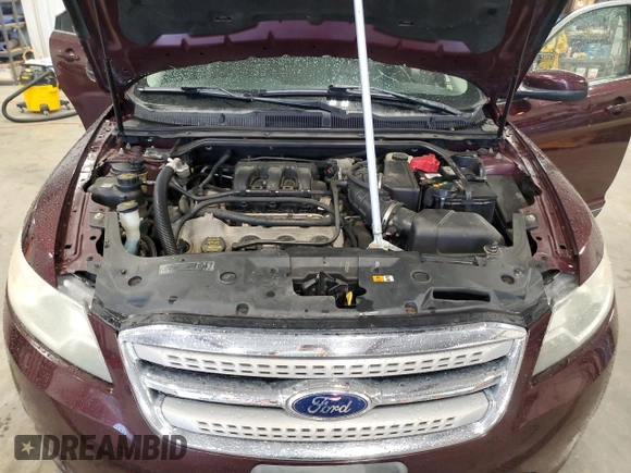 2011 Ford Taurus SEL z VIN 1FAHP2HW5BG182538, wystawiony jako Copart lot #55148545 z przebiegiem 181 815 mil mil oraz Nie do naprawy • Non repairable. Historia ofert i sprzedaży dostępna na DreamBid. Obrazek 11.