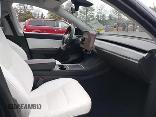 2022 Tesla Model Y Performance with VIN 7SAYGDEF7NF403701, listed as a IAAI auction lot 41961532 with 83,728 mi miles and . Bid and sale history available at DreamBid. Image 5.