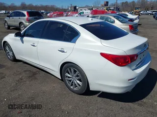 2014 Infiniti Q50 Sport with VIN JN1BV7AP7EM679296, listed as a IAAI auction lot 41834654 with 126,337 mi miles and . Bid and sale history available at DreamBid. Image 3.