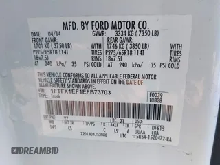 2014 Ford F-150 XL with VIN 1FTFX1EF1EFB73703, listed as a IAAI auction lot 41576855 with 122,721 mi miles. Bid and sale history available at carsss.com. Image 9.