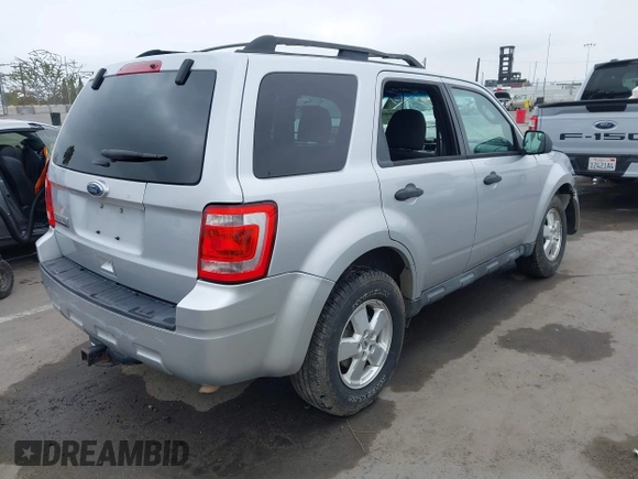 2012 Ford Escape XLT with VIN 1FMCU9D74CKB79211, listed as a IAAI auction lot 42464491 with 144,757 mi miles and . Bid and sale history available at DreamBid. Image 4.