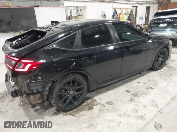 2023 Honda Civic Sport z VIN 19XFL2H85PE007244, wystawiony jako IAAI lot #41572024 z przebiegiem 21 182 mil mil oraz . Historia ofert i sprzedaży dostępna na DreamBid. Obrazek 4.