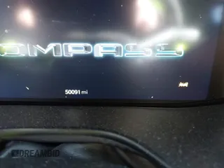 2022 Jeep Compass Trailhawk with VIN 3C4NJDDB4NT136213, listed as a IAAI auction lot 41689612 with 50,091 mi miles and . Bid and sale history available at DreamBid. Image 7.
