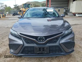 2023 Toyota Camry SE with VIN 4T1G11AK6PU761681, listed as a IAAI auction lot 41766008 with 18,690 mi miles. Bid and sale history available at carsss.com. Image 12.
