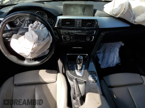 2012 BMW 3 Series 335i with VIN WBA3A9C5XCF474803, listed as a Copart auction lot 57940675 with 121,960 mi miles and Salvage title. Bid and sale history available at DreamBid. Image 8.