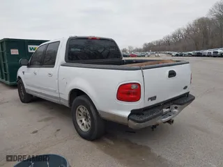2001 Ford F-150 SuperCrew XLT with VIN 1FTRW07L61KB49220, listed as a IAAI auction lot 41826223 with 281,547 mi miles. Bid and sale history available at carsss.com. Image 3.