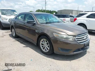 2015 Ford Taurus SE z VIN 1FAHP2D81FG117862, wystawiony jako IAAI lot #42330445 z przebiegiem 181 780 mil mil oraz . Historia ofert i sprzedaży dostępna na DreamBid. Obrazek 1.