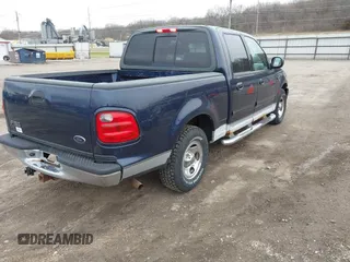 2003 Ford F-150 XLT with VIN 1FTRW07L63KD51221, listed as a IAAI auction lot 41883942 with Not Provided miles. Bid and sale history available at carsss.com. Image 4.