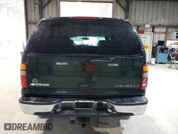 2003 Chevrolet Tahoe LS z VIN 1GNEC13Z23R264941, wystawiony jako Copart lot #56033135 z przebiegiem 195 068 mil mil oraz Szkoda całkowita • Salvage title. Historia ofert i sprzedaży dostępna na DreamBid. Obrazek 6.