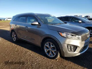 2016 Kia Sorento SXL z VIN 5XYPKDA15GG105354, wystawiony jako Copart lot #79710674 z przebiegiem 167 327 mil mil oraz Czysty tytuł • Clean title. Historia ofert i sprzedaży dostępna na DreamBid. Obrazek 4.