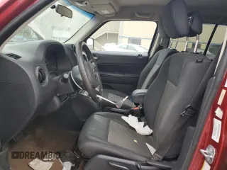 2014 Jeep Patriot Latitude with VIN 1C4NJPFA8ED818233, listed as a Copart auction lot 43947895 with 142,474 mi miles and Salvage Title. Bid and sale history available at carsss.com. Image 7.