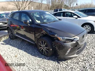 2016 Mazda CX-3 Grand Touring z VIN JM1DKBD7XG0107274, wystawiony jako Copart lot #52137385 z przebiegiem 35 376 mil mil oraz Szkoda całkowita • Salvage title. Historia ofert i sprzedaży dostępna na DreamBid. Obrazek 4.