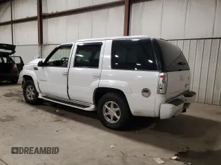 2000 Cadillac Escalade z VIN 1GYEK63R0YR185780, wystawiony jako Copart lot #80620994 z przebiegiem 16 717 mil mil oraz Szkody całkowita. Historia ofert i sprzedaży dostępna na DreamBid. Obrazek 2.