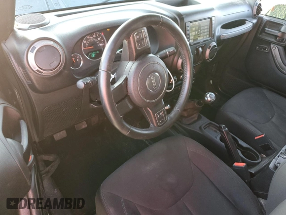 2018 Jeep Wrangler Willys Wheeler W z VIN 1C4AJWAGXJL852498, wystawiony jako Copart lot #52866945 z przebiegiem 90 515 mil mil oraz Szkoda całkowita • Salvage title. Historia ofert i sprzedaży dostępna na DreamBid. Obrazek 8.