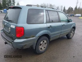 2005 Honda Pilot EX with VIN 2HKYF18465H565524, listed as a IAAI auction lot 41927812 with 218,637 mi miles. Bid and sale history available at carsss.com. Image 4.