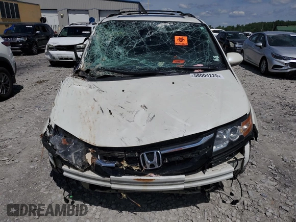 2014 Honda Odyssey Touring with VIN 5FNRL5H98EB053486, listed as a Copart auction lot 58004225 with 201,526 mi miles and Salvage title. Bid and sale history available at DreamBid. Image 5.
