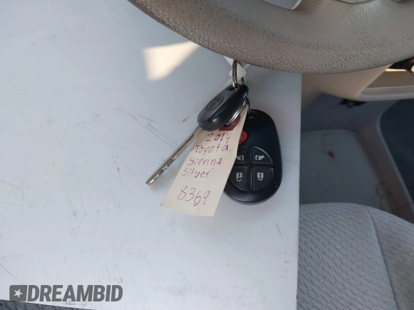 2014 Toyota Sienna LE AAS with VIN 5TDKK3DC1ES520561, listed as a IAAI auction lot 41959565 with 115,908 mi miles and . Bid and sale history available at carsss.com. Image 11.