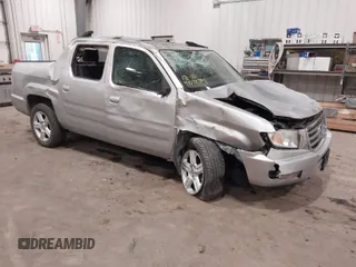 2014 Honda Ridgeline RTL with VIN 5FPYK1F57EB012362, listed as a IAAI auction lot 41078509 with 149,590 mi miles. Bid and sale history available at carsss.com. Image 1.