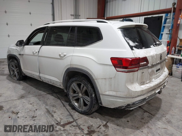 2019 Volkswagen Atlas SE z VIN 1V2XR2CA0KC595596, wystawiony jako IAAI lot #41410019 z przebiegiem 103 336 mil mil oraz . Historia ofert i sprzedaży dostępna na DreamBid. Obrazek 3.