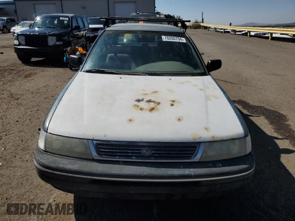 1994 Subaru Legacy L with VIN 4S3BJ6337R7955431, listed as a Copart auction lot 70200794 with 281,694 mi miles and Salvage Title. Bid and sale history available at DreamBid. Image 5.
