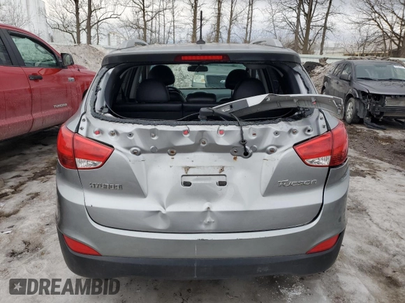 2010 Hyundai Tucson GLS with VIN KM8JU3AC2AU113747, listed as a Copart auction lot 48031375 with 220,982 mi miles and Salvage Title. Bid and sale history available at DreamBid. Image 6.