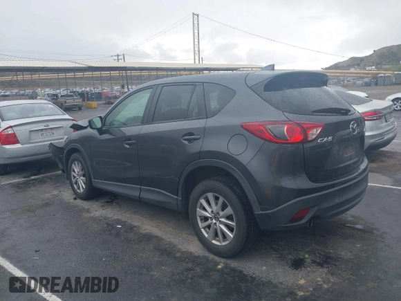 2016 Mazda CX-5 Touring with VIN JM3KE2CY7G0630056, listed as a IAAI auction lot 41817525 with 97,844 mi miles and . Bid and sale history available at DreamBid. Image 3.