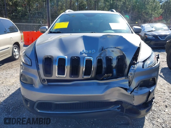 2016 Jeep Cherokee Limited with VIN 1C4PJLDB8GW239294, listed as a IAAI auction lot 41675712 with 140,491 mi miles. Bid and sale history available at carsss.com. Image 12.