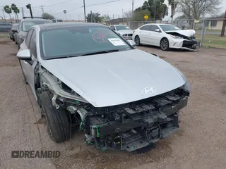 2024 Hyundai Sonata Hybrid Limited with VIN KMHL54JJ1RA087584, listed as a IAAI auction lot 41615405 with 18,684 mi miles. Bid and sale history available at carsss.com. Image 1.