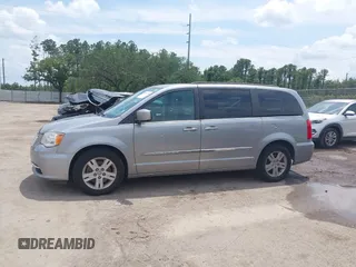 2016 Chrysler Town & Country Touring with VIN 2C4RC1BG4GR193462, listed as a IAAI auction lot 42200990 with 140,430 mi miles. Bid and sale history available at carsss.com. Image 14.