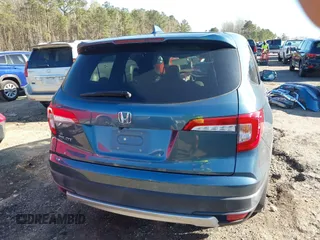 2021 Honda Pilot EX-L with VIN 5FNYF5H55MB031914, listed as a IAAI auction lot 41832882 with 30,630 mi miles. Bid and sale history available at carsss.com. Image 17.