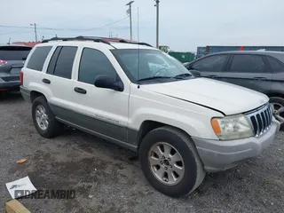 2001 Jeep Grand Cherokee Laredo z VIN 1J4GX48S91C516553, wystawiony jako IAAI lot #42270834 z przebiegiem 249 038 mil mil oraz . Historia ofert i sprzedaży dostępna na DreamBid. Obrazek 1.