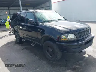 1998 Ford Expedition XLT z VIN 1FMPU18L1WLC29118, wystawiony jako IAAI lot #41709778 z przebiegiem 237 536 mil mil oraz . Historia ofert i sprzedaży dostępna na DreamBid. Obrazek 1.