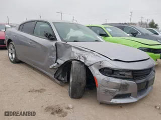 2018 Dodge Charger R/T with VIN 2C3CDXCTXJH148030, listed as a IAAI auction lot 41225873 with 105,069 mi miles. Bid and sale history available at carsss.com. Image 1.