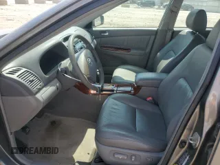 2005 Toyota Camry LE with VIN 4T1BF32K85U614653, listed as a Copart auction lot 52860195 with 156,675 mi miles and Salvage Title. Bid and sale history available at DreamBid. Image 7.
