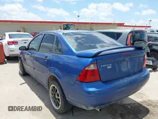 2005 Ford Focus S with VIN 1FAFP34N65W158687, listed as a IAAI auction lot 42706418 with Not provided miles and . Bid and sale history available at DreamBid. Image 3.