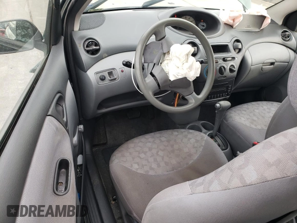 2000 Toyota ECHO with VIN JTDAT1233Y0080978, listed as a Copart auction lot 81164804 with 80,335 mi miles and Salvage Title. Bid and sale history available at DreamBid. Image 8.